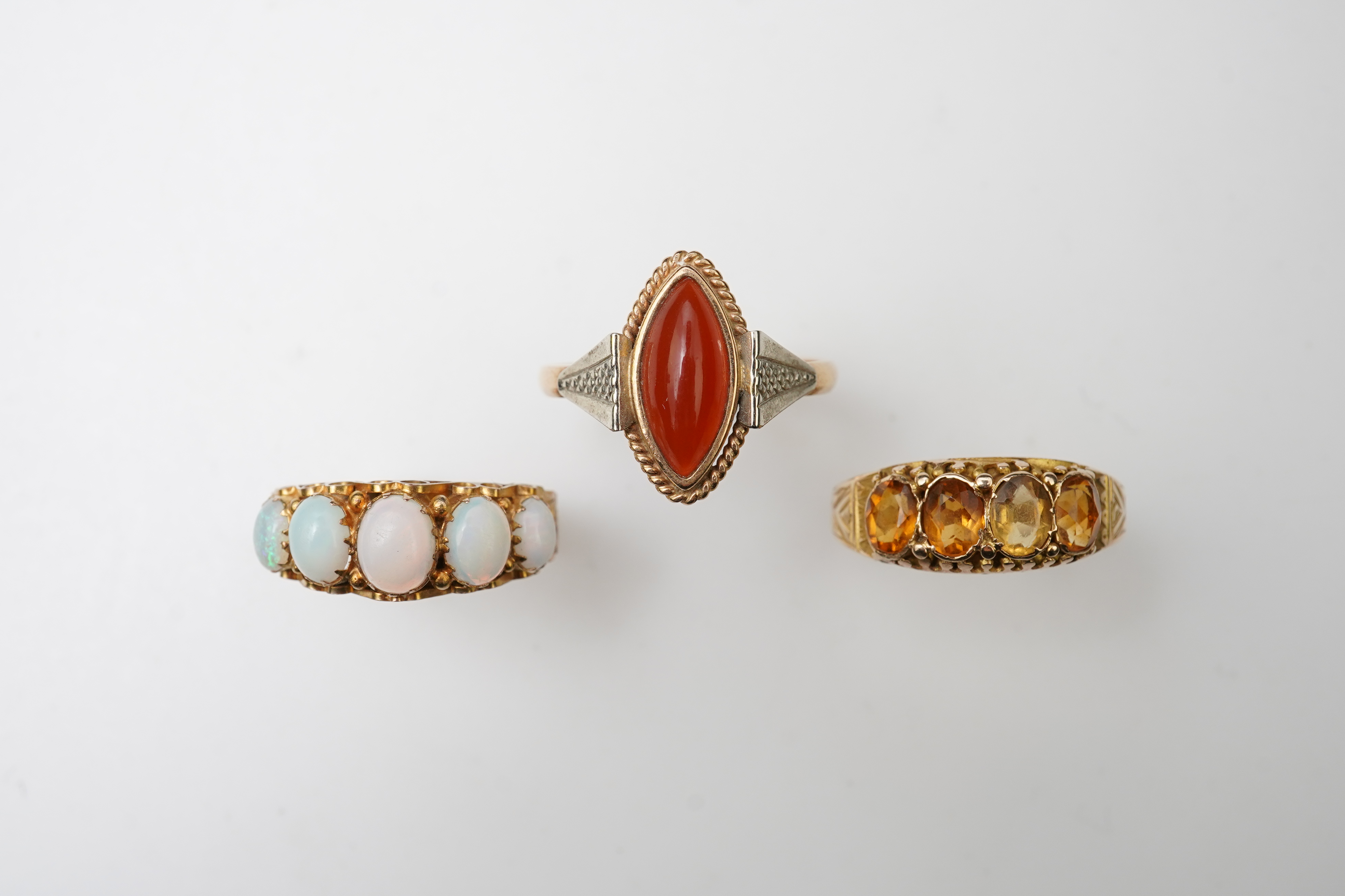Three gem-set rings